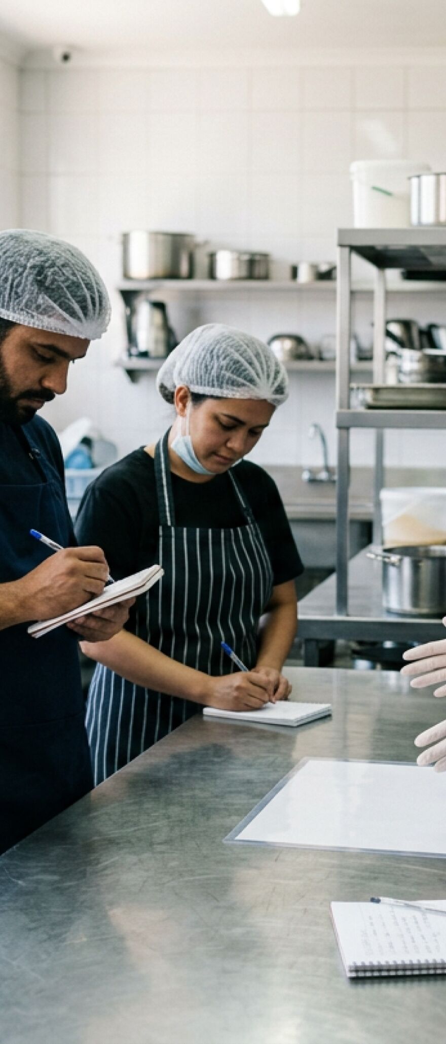 Food safety trainer presenting to hospitality staff during a training session